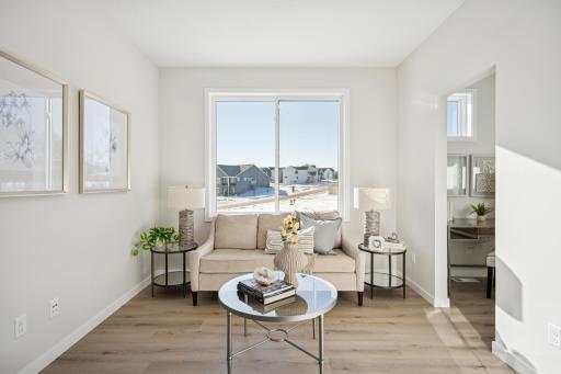 Den, office, or sitting room with French doors, and pocket office....