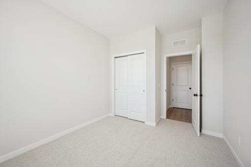 Front bedroom or office with closet