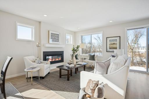 One-level living plus finished lower level! 2 bedrooms plus office on main floor! And Another bedroom and bath and large storage room at lower level! Amazing Backyard Views! Abundance of windows!