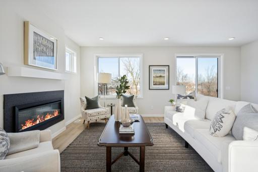 Move right in! One-level living plus finished lower level! 2 bedrooms plus office on main floor! And Another bedroom and bath and large storage room at lower level! Amazing Backyard Views! Abundance of windows!