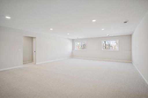 Finished Lower Level includes another bedroom, large bathroom, linen closet and large Mechanical room and storage room!