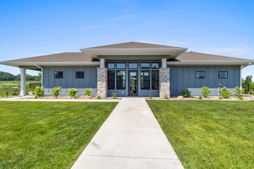 Riverwalk Clubhouse features gathering room with fireplace, huge kitchen and dining room. For Riverwalk homeowners: reserve for your get-together, event or party!