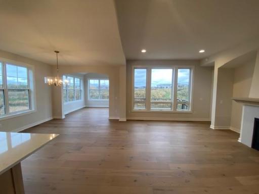Photo for 7440 Elm Lane, Corcoran, MN 55340 - listing #6807776 Charming Villa with HOA lawn care and snow removal. Large azek covered front porch. Beautiful exterior! Landscaping sod & irrigation now completed. Plus Azek deck & stairs and abundance of windows with pond views.
