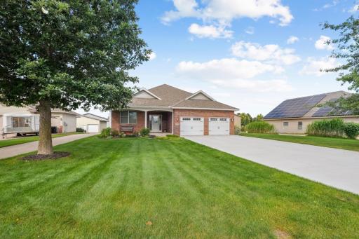 Nicely landscaped lawn and heated garage.