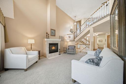 Photo for 14393 Embassy Way, Saint Paul, MN 55124 - listing #6808019 Main floor living at its best with this dramatic 2 story living room and foyer, and main floor primary bedroom suite!