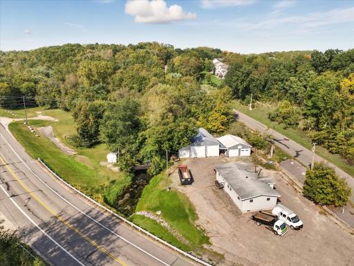Ideal location close to town, Buffalo Lake and the beauty of Mill Creek running through the property. Property consists of a 3 bedroom, 1 bath home which has been used as an office in recent years. 2.3 acres total with 3PIDs.
