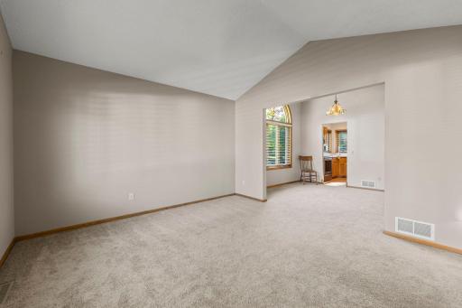 View from the foyer into living room and dining room