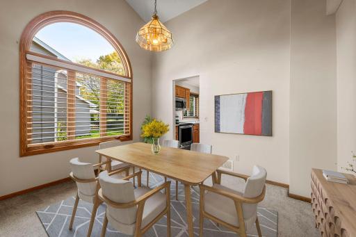 Formal Dining with a lovely crescent window to set an elegant tone.