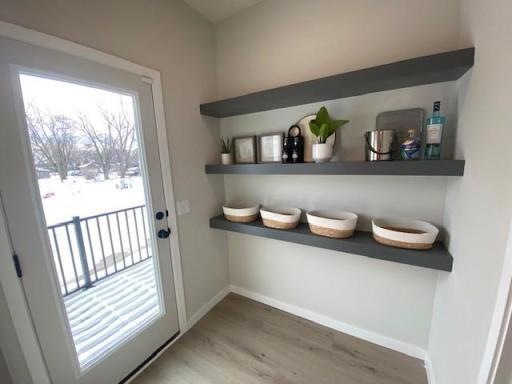 Extra storage area, Pantry, and Grill Deck to back yard!