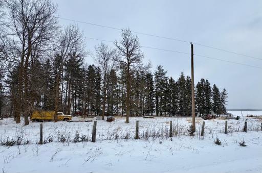 From road, fence line and mature trees