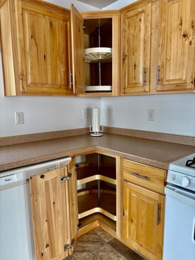 Hickory cabinet with dual lazy susans