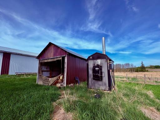 Outdoor wood boiler and wood shed