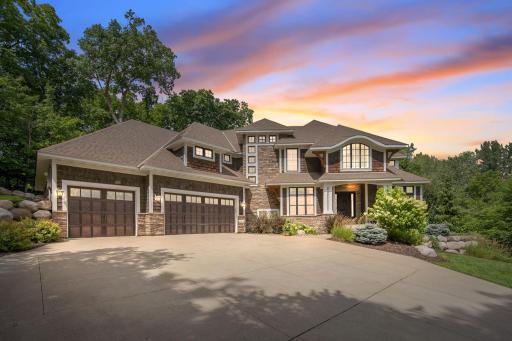 Welcome to this stunning executive 2 story on a serene 1.5 acre wooded lot! This home offers an incredible value and a perfect combination of luxury and comfort.