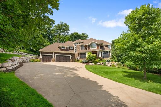 5 BR / 6 BA Gonyea Built Home with luxury finishes, main level sport court, wooded lot and fenced yard! Fall in love with this porch Incredible 5 Bedroom / 6 Bathroom home with sport court, wine cellar, 3 season porch, sunroom, home office and more!