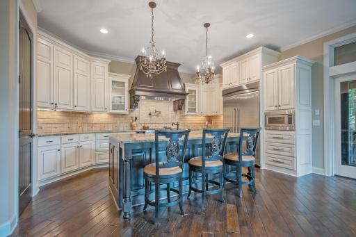 Gourmet Kitchen with custom cabinetry, and stunning center island.