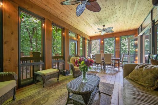 Its PORCH SEASON!! There is no better time to relax in the porch than a MN fall! This amazing space allows you to extend your outdoor living time with fully retractable windows so you can enjoy this amazing room in almost every season!