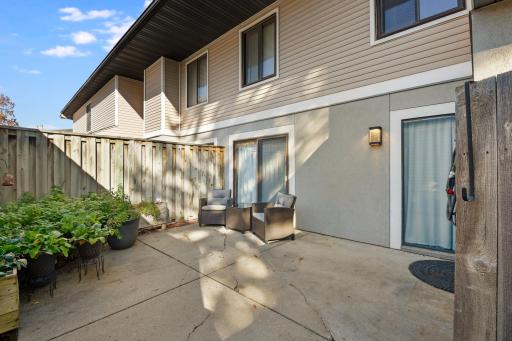 Photo for 1124 Trailwood S, Hopkins, MN 55343 - listing #6808573 This patio is fantastic- large, private, and accessible either from sliding patio doors or the front door.