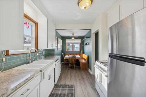 Large kitchen bright and sunny with a breakfast nook