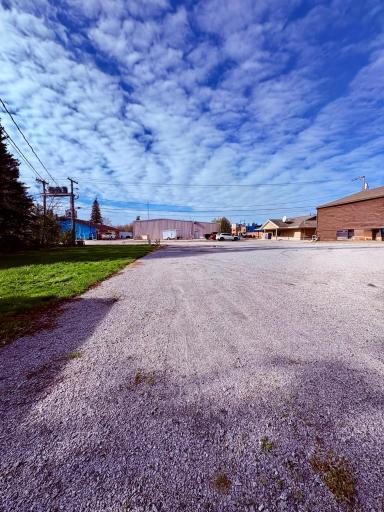 New crushed granite parking lot- NO MOWING!