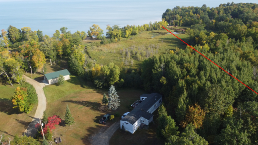 The mobile home will be removed once the property is sold. This would be another potential great building site! The line is a best-effort approximation of the property boundary.