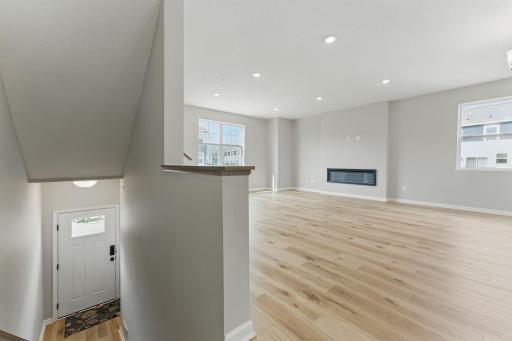 Entry Foyer Leads you up to a Grand Open Space on the Main Floor