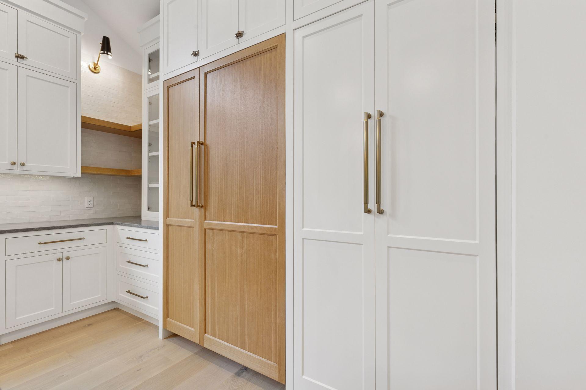 Refrigerator on left, Pantry on Right