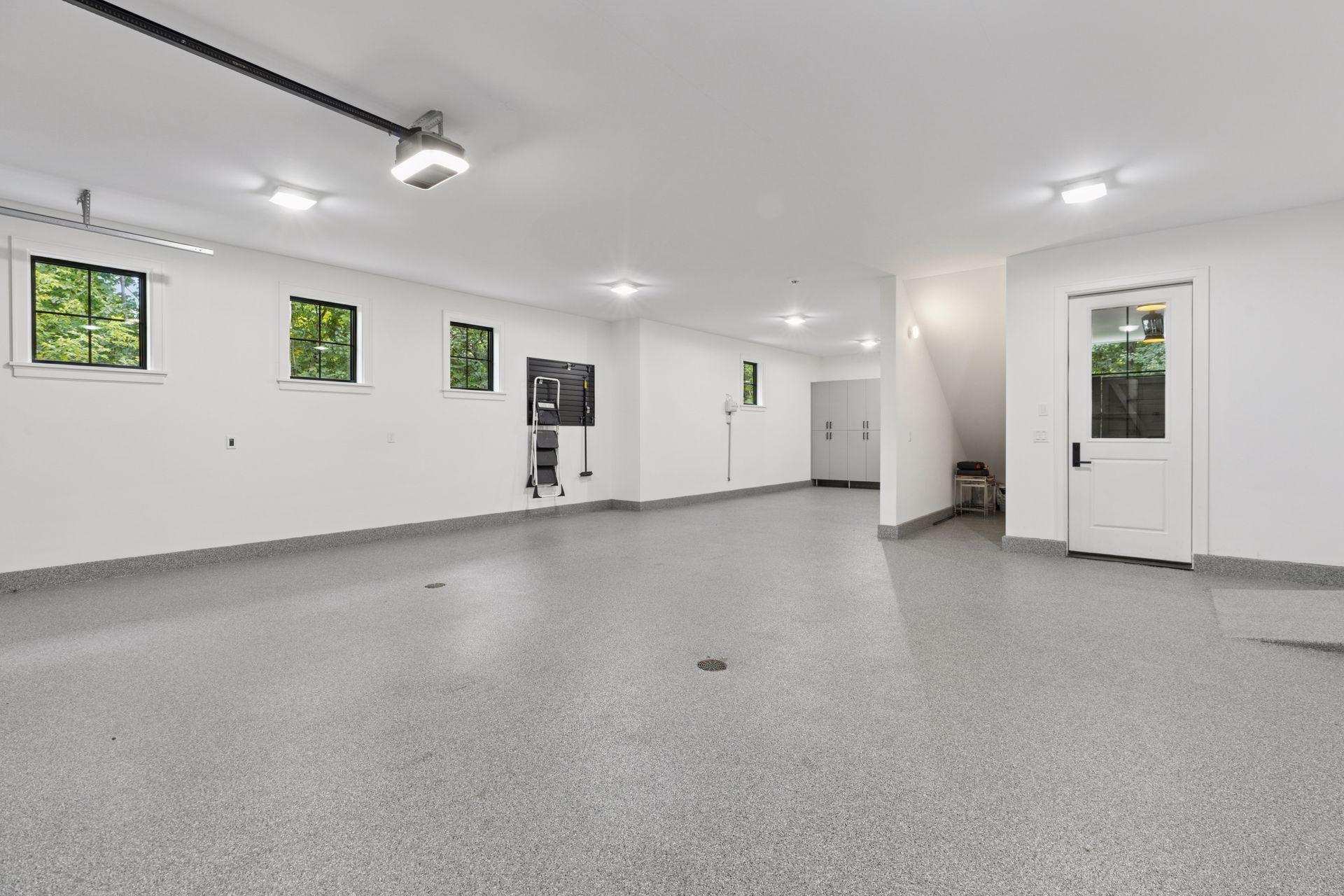 Awesome garage that is double deep. Heated, floor drains and EV wired