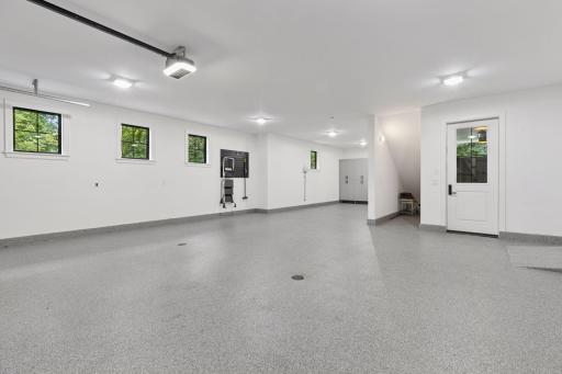 Awesome garage that is double deep. Heated, floor drains and EV wired