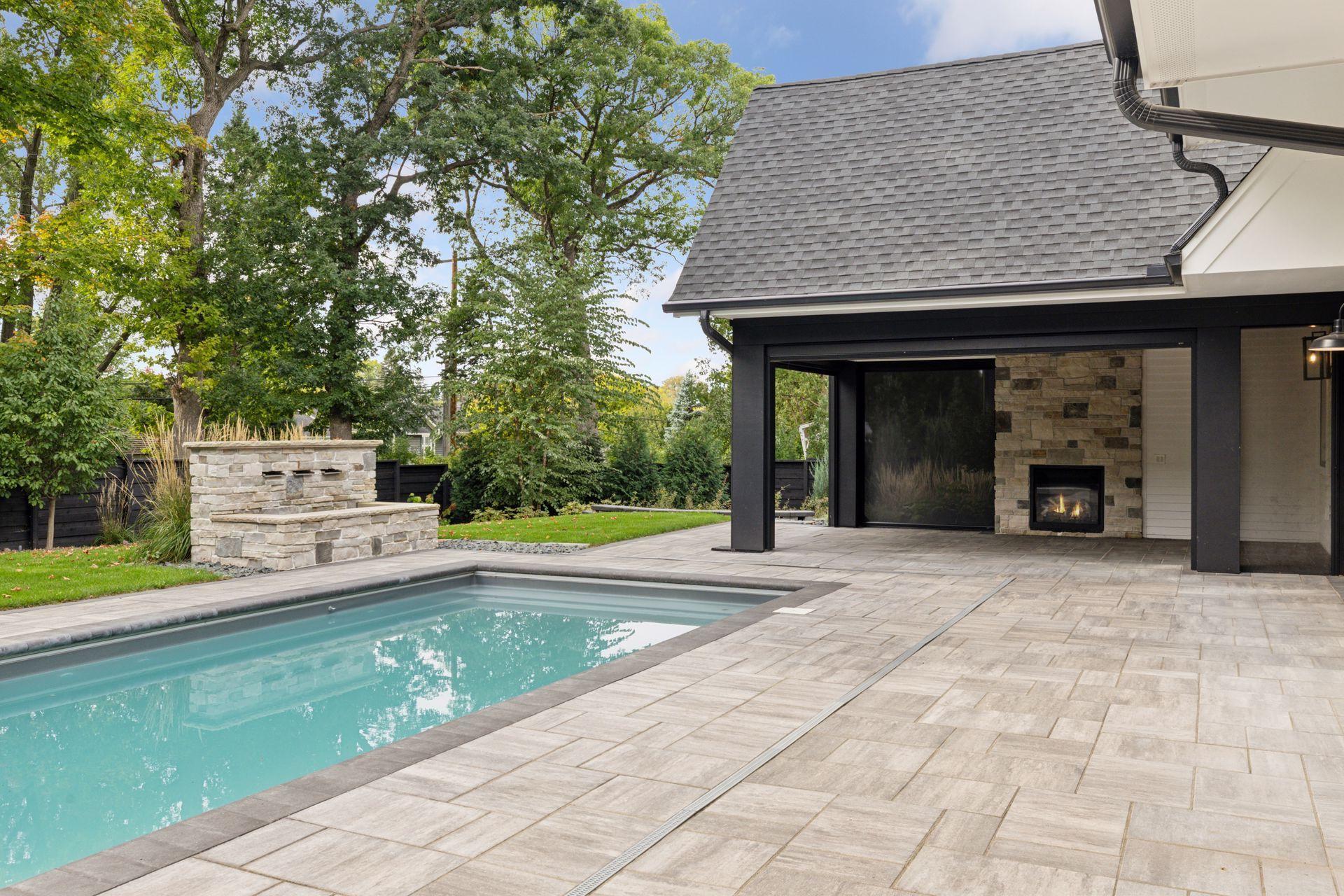 Perfect backyard - Pool, 3 season with Phantom Screens & Fireplace, water fountain and complete privacy.