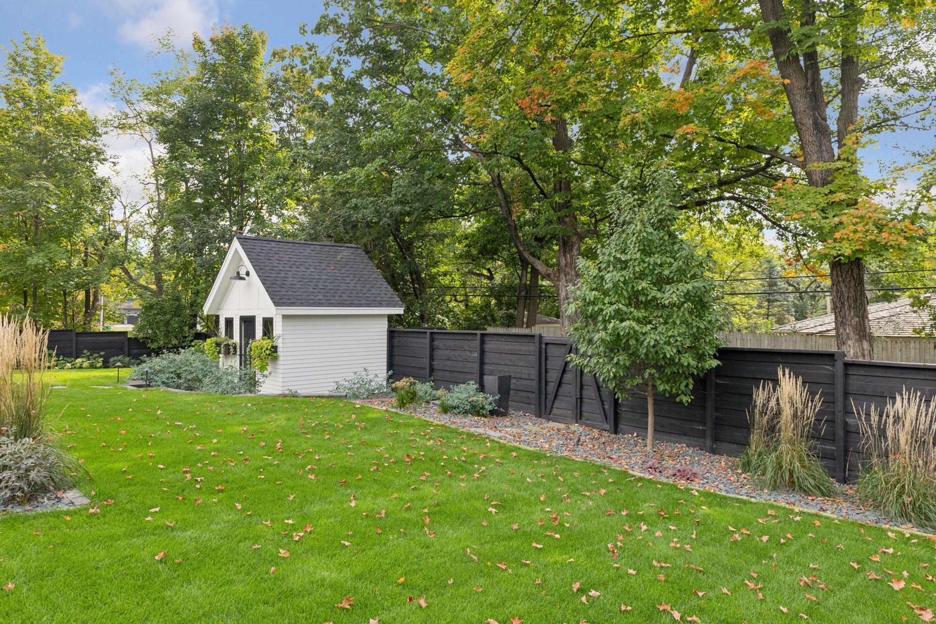 The space behind the fence belongs to this property. Need more space, simply room the fence