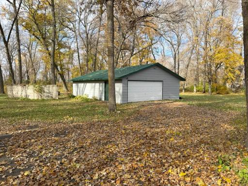 Photo for 7331 US Highway 169, Garrison, MN 56450 - listing #6809436 A shot of this conveniently located garage / "Studio" living quarters structure, with view of building exterior from the driveway coming in...