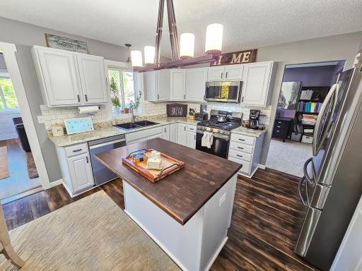 New kitchen appliances with a gas range. This kitchen is a cook and entertainer's dream.