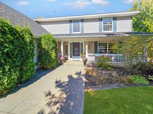 The stamped concrete drive and entry offer a great touch to this beautiful home.