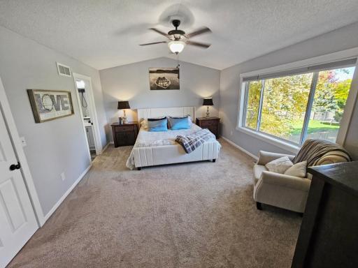 The main bedroom, on the upper level, offers vaulted ceilings, a full bath and a huge closet. Making it an awesome retreat.