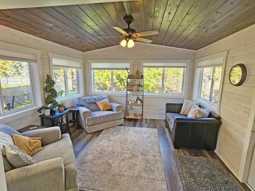 This 4 season porch is an excellent place for relaxing or a morning coffee.