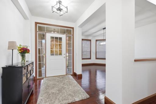 The minute you enter you will appreciate the gleaming hardwood floors and light and bright open floor plan.
