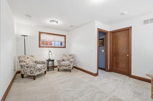 The loft over looking the 2 story great room is perfect for reading, music room, office or family game fun.