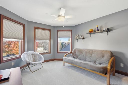 One of 4 bedrooms upstairs with bay windows.