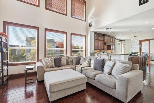 The great room with its built in surround sound system is open onto the kitchen.