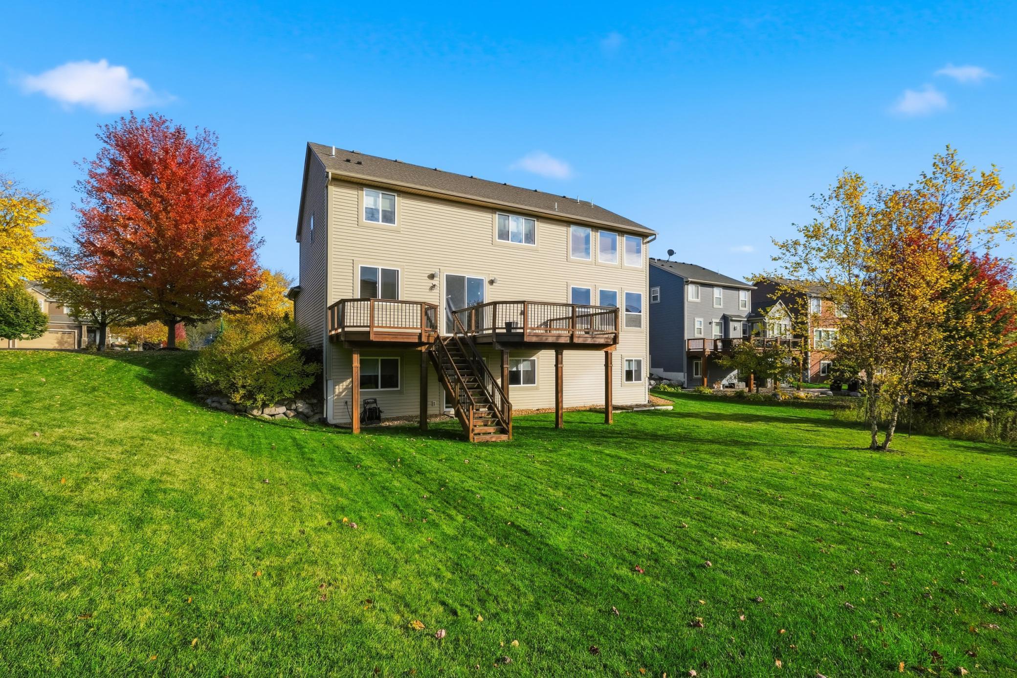 The spacious custom deck along with the premium walkout lot can be enjoyed for entertaining family fun