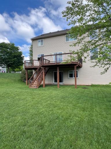 Another view of the spacious backyard and deck