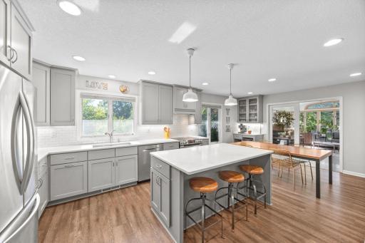 Open concept at its finest! You will love everything about this gorgeous kitchen and desired open concept to dining, living, and the amazing oversized 4 season porch.