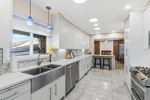 Photo for 882 Transit Avenue, Roseville, MN 55113 - listing #6809940 What a fabulous updated kitchen with stainless steel sink, dishwasher, trash compactor, range with a double oven, microwave and refrigerator.