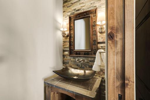 This conveniently located half bathroom serves the main floor common spaces.