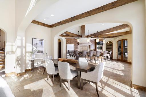The dining room is open to the kitchen and great room. French doors in the dining room open up to a Juliet balcony.