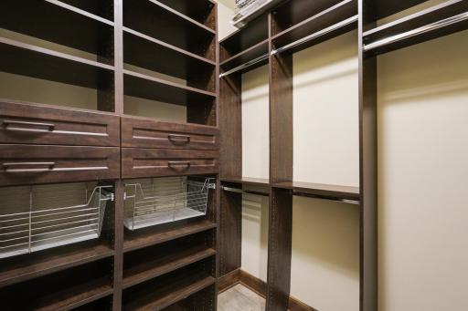 The mud room connects to the garage and kitchen, and features a large sink, plenty of cabinet storage and a large walk-in closet.