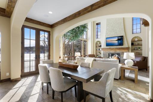 The dining room is open to the kitchen and great room. French doors in the dining room open up to a Juliet balcony.