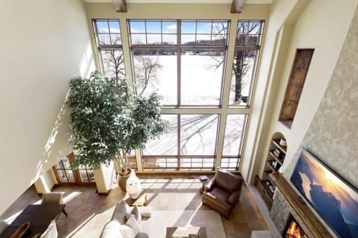 The upper-level hosts the primary ensuite and three additional bedrooms supported by two additional bathrooms, a well-appointed laundry room and a reading nook overlooking the great room.