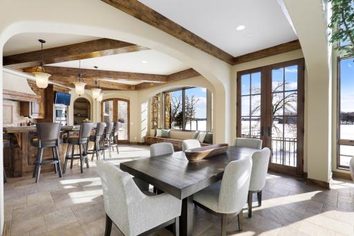 The dining room is open to the kitchen and great room. French doors in the dining room open up to a Juliet balcony.