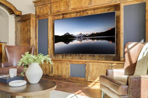 The walkout lower level is set for entertaining lake guests, boasting a fully equipped bar attached to the media room, a climate-controlled wine room, a tasting room, a 5th bedroom, additional storage, and a lake storage room with a 2nd laundry.